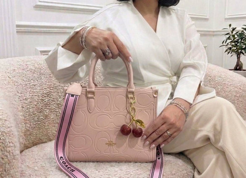 کیف جدید زنانه مارکدار کوچ وارداتی همراه بند بلندو اکسسوری